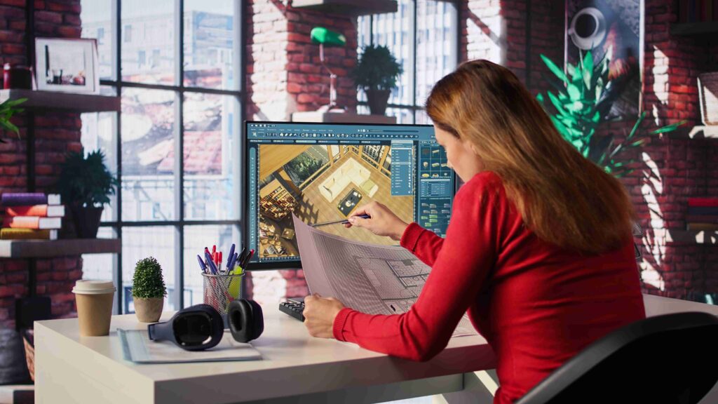 freelancer-designer-decorates-apartment-floor-plan-using-blueprints-pc_11zon-1024x576 KDArchitecX.net: Your Guide to Innovative Architecture in 2025