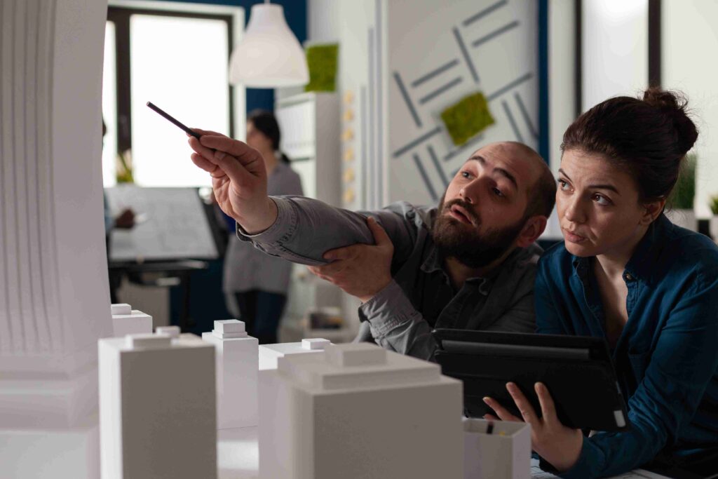 team-construction-architects-work-tablet-office_11zon-1024x683 KDArchitecX.net: Your Guide to Innovative Architecture in 2025
