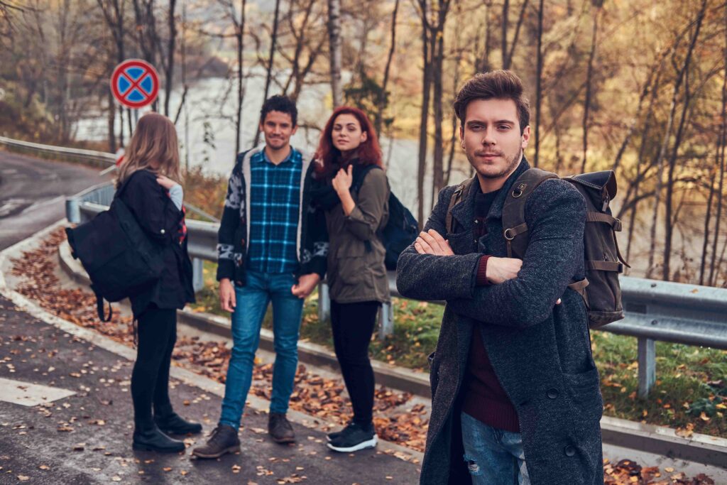 travel-hitchhiking-adventure-concept-group-young-hikers-standing-road-sidelines-beautiful-autumn-forest_11zon-1024x683 Life of Hopie Carlson: Inside Life of Tucker Carlson’s Daughter (2025)